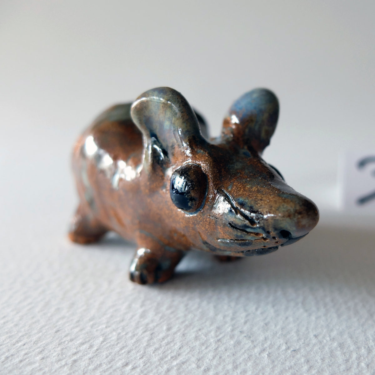 The Cheerful Amber Mouse (#31) – Handcrafted Ceramic Figurine