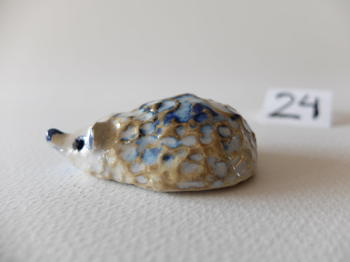 The Frosty Little Hedgehog (#24) – Handcrafted Ceramic Figurine