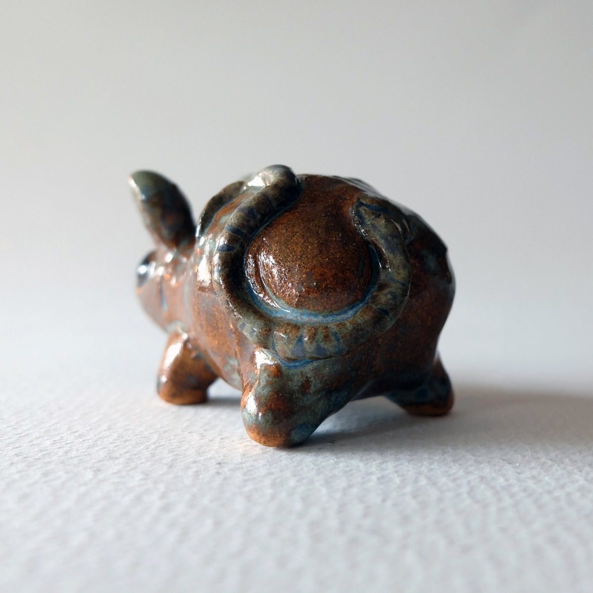 The Cheerful Amber Mouse (#31) – Handcrafted Ceramic Figurine