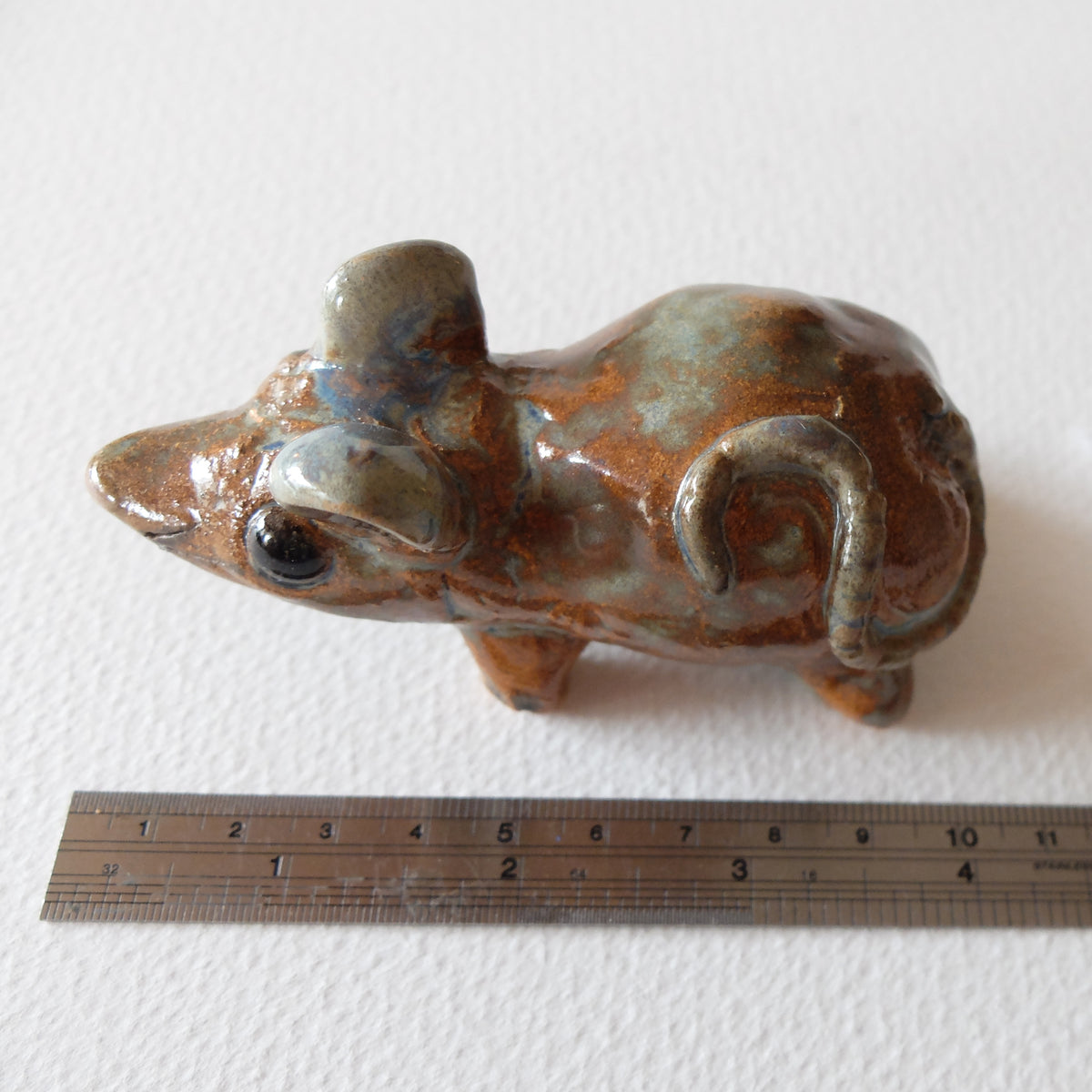 The Cheerful Amber Mouse (#31) – Handcrafted Ceramic Figurine