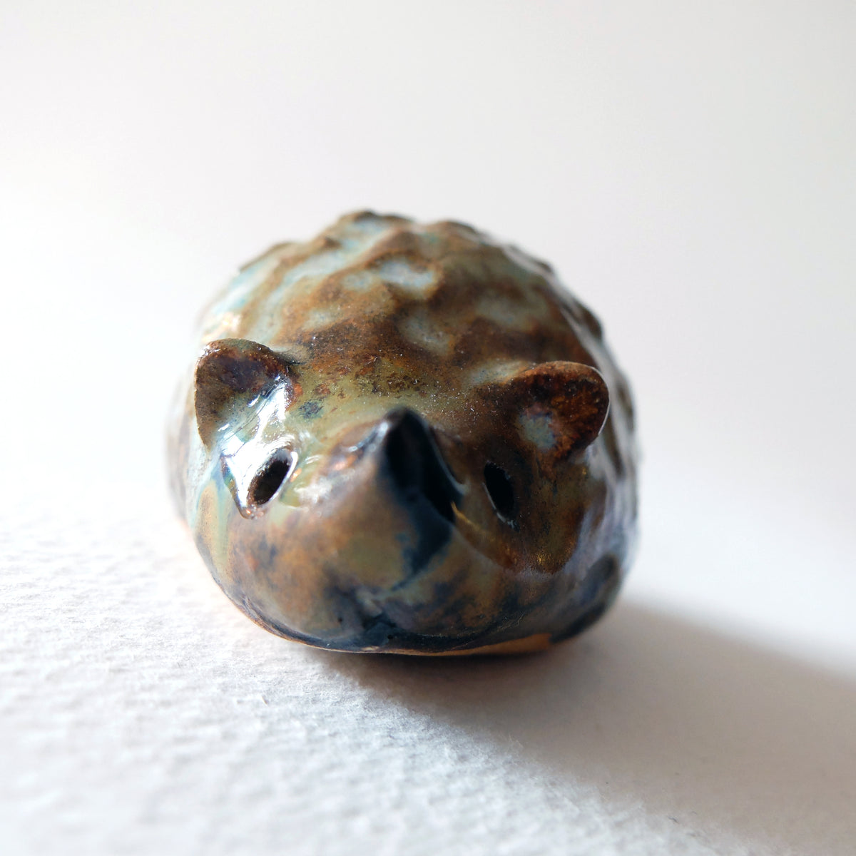 The Iridescent Knobby Hedgehog (#35) – Handcrafted Ceramic Figurine